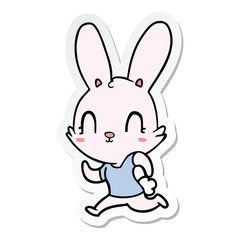 Fototapeta na wymiar sticker of a cute cartoon rabbit running