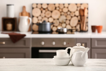 Obraz na płótnie Canvas Set of tableware in modern kitchen