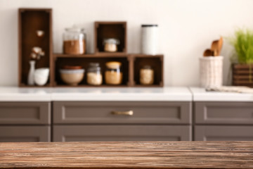 Fototapeta na wymiar Wooden table in modern kitchen