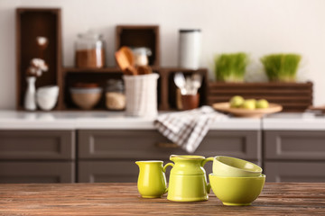 Set of tableware in modern kitchen