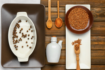 Set of kitchenware on wooden background