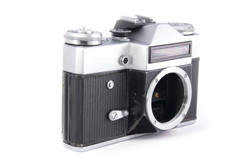 old film photo camera in half turn without lens on white background. isolated.