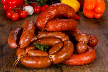 Pork sausages over wooden