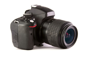 Fototapeta premium modern DSLR photo camera with a lens in half a turn on a white background. isolated.