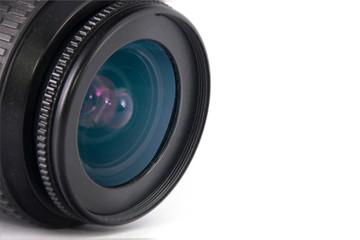 close-up photo lens with a blue-green tint on a white background.