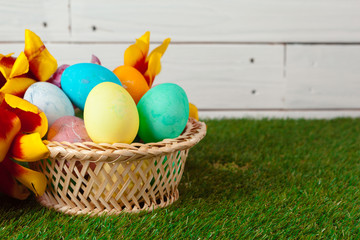 Easter Eggs with flower on Green Grass