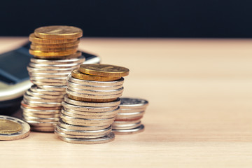 stack of coins and calculator,concept idea for business finance