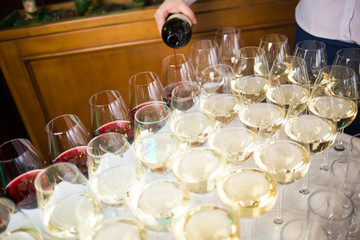 waiter pouring wine