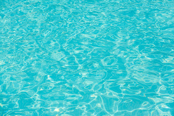 surface of blue swimming pool,background of water in swimming pool.