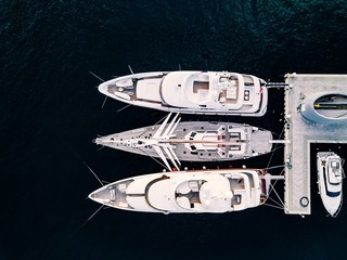 Aerial view from above at the luxury yachts in the marina