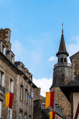 Fototapeta na wymiar Low angle view of old tower in Dinan against sky