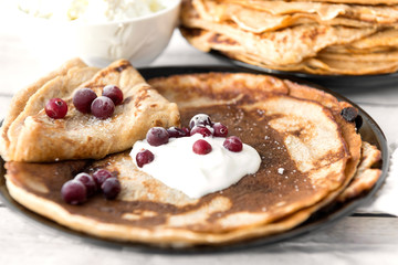 pancakes, pancakes with berries, pancakes with cranberries, pancakes with sour cream