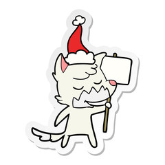 friendly sticker cartoon of a fox wearing santa hat