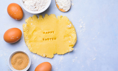 Easter Baking Background, Dough with Happy Easter Lettering