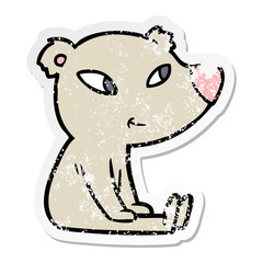 distressed sticker of a cute cartoon bear sitting