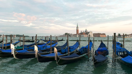 Fototapeta na wymiar san giorgio maggiore and gondolas tied up at piazza san marco, venice