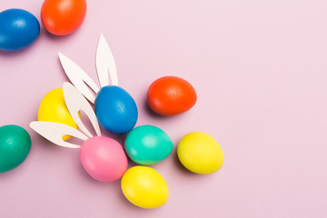easter eggs on pink background