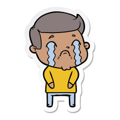 sticker of a cartoon man crying