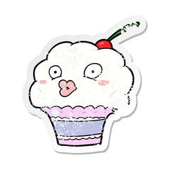 distressed sticker of a cartoon cupcake