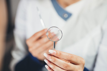 Lenses to check your vision.  ophthalmologist diagnoses  patient myopia.