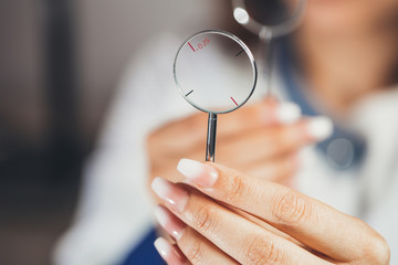 Lenses to check your vision.  ophthalmologist diagnoses  patient farsightedness. Focus on lenses