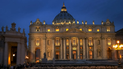 night close up of the outside of saint peter's basilica, rome