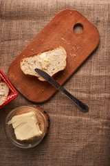 breads and butter concept of teasty home food close up on table