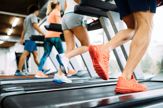 Picture Of People Running On Treadmill In Gym