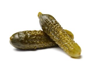 Appetizing salted cucumbers on white isolated background. Close-up. Side view.