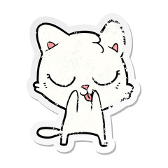 distressed sticker of a cartoon cat
