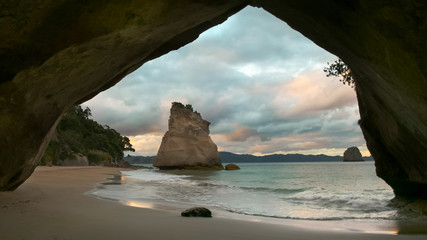 sunset at cathedral cove on the coromandel peninsula in nz