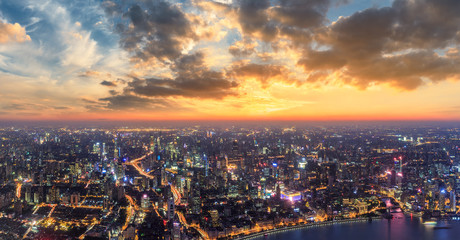 Shanghai city skyline and beautiful colorful clouds at night