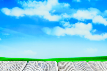 White wooden table on the background of a rural landscape