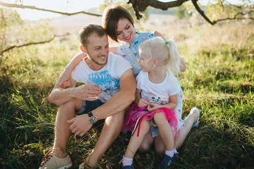 Happy Young  Family have a good time In The Park