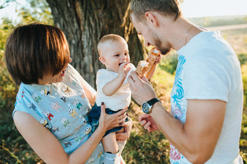 Happy Young  Family have a good time In The Park