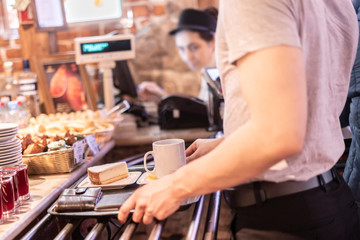 attractive male choose food in street cafe b