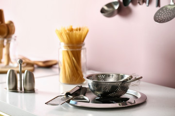 Set of kitchen utensils on table