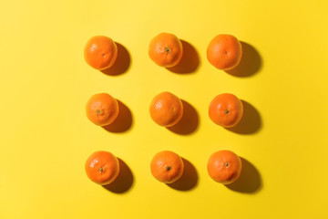 Tasty tangerines on color background