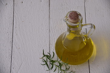 olive oil in bottle on wooden table
