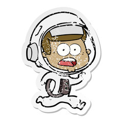 distressed sticker of a cartoon surprised astronaut