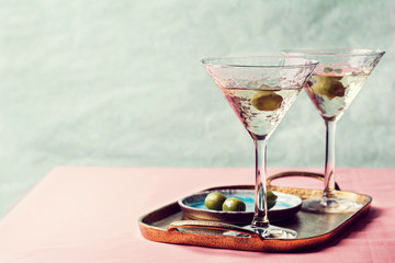 Martini cocktail with green olive - obrazy, fototapety, plakaty