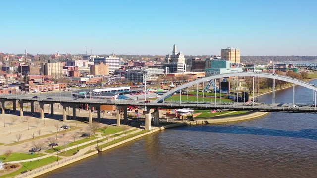 Good drone aerial establishing shot of Davenport Quad Cities Iowa and the Mississippi River foreground.