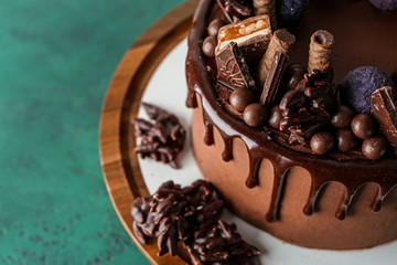 Tasty chocolate cake on table, closeup