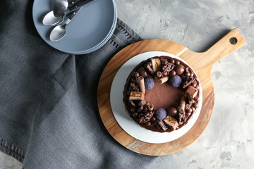 Tasty chocolate cake on table