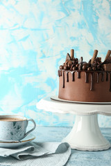 Tasty chocolate cake on table