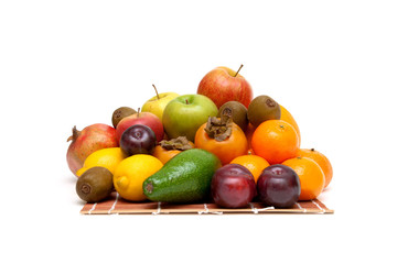 fresh juicy fruits on a white background