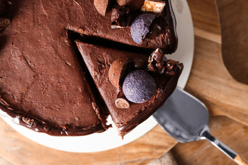 Tasty chocolate cake on table, closeup