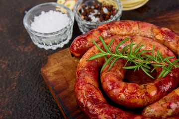 Grilled or Roasted spiral pork sausages with rosemary