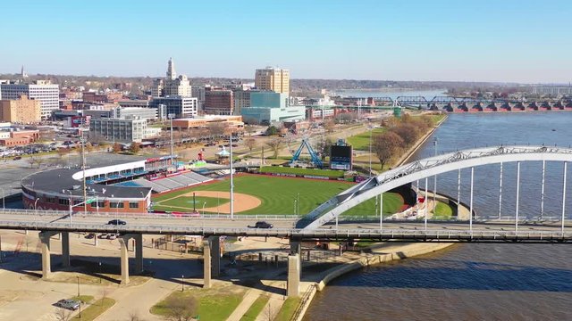 Good drone aerial establishing shot of Davenport Quad Cities Iowa and the Mississippi River foreground.