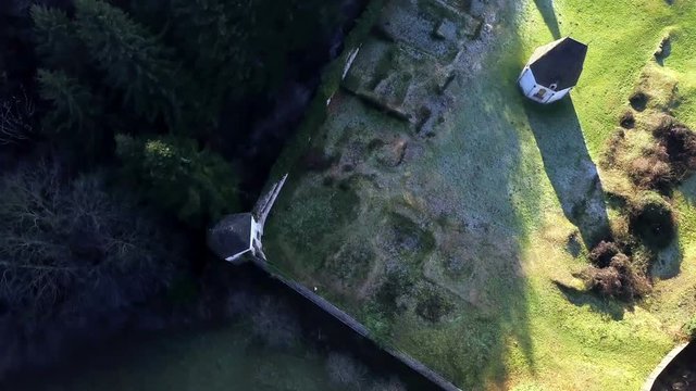LOCE, SLOVENIA, 2019.01.25: Aerial: Flying over remainings of Zice monastery. Filming remainings of ancient French monastery Zicka kartuzija on beautiful sunny winter morning.